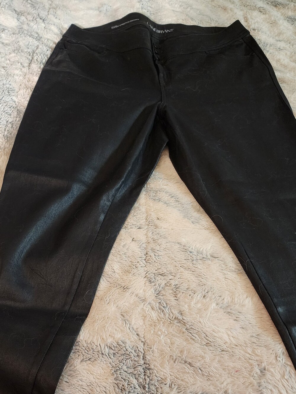 Women's Black Coated Jeans. Never Worn!!!!!